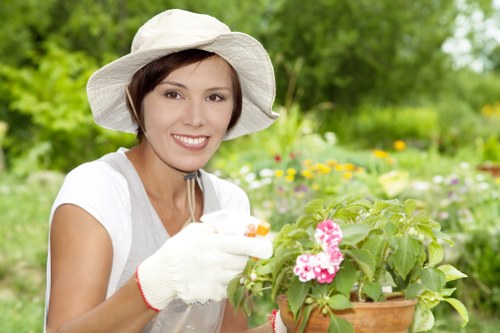 A gardener discussing appointment details and quotation terms with a customer
