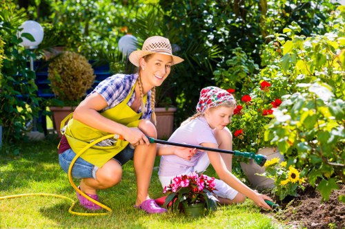 Seasonal garden maintenance in Hampton Hill with border care and pruning